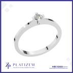 A silver solitaire ring with a round brilliant-cut diamond set in a four-prong setting, displayed on a white background with a blue border and the Platizem brand logo at the bottom.