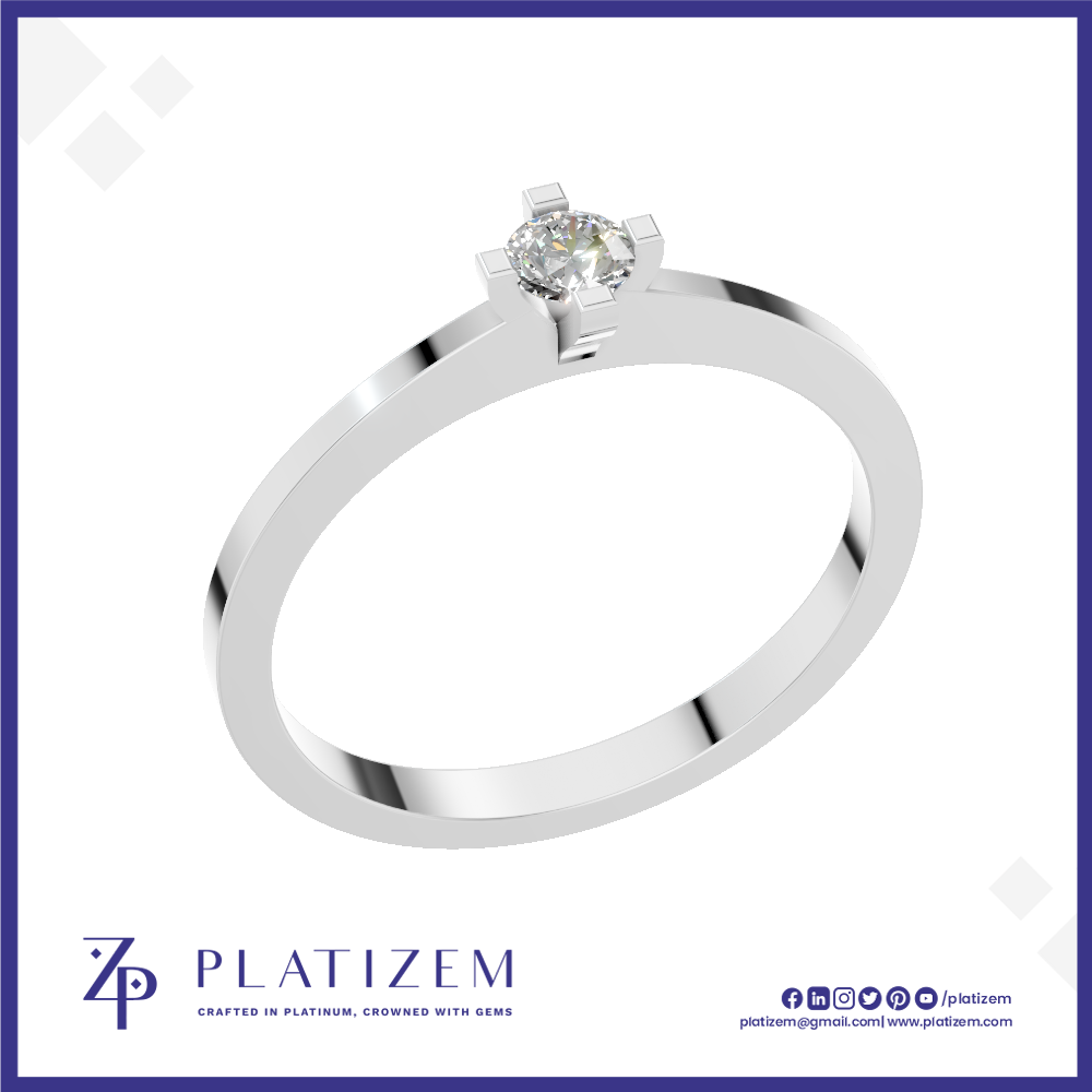 A silver solitaire ring with a round brilliant-cut diamond set in a four-prong setting, displayed on a white background with a blue border and the Platizem brand logo at the bottom.