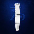 A white gold or platinum solitaire ring with a round brilliant-cut diamond, shown in a side profile view against a textured dark blue background with a subtle geometric logo.