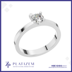 A classic solitaire engagement ring with a round brilliant-cut diamond set in a polished white gold or platinum band, presented on a white background with a blue border and the Platizem brand logo at the bottom.