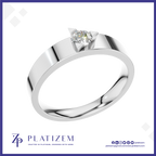 A silver-toned solitaire ring with a round-cut clear gemstone in a prong setting, shown on a white background with the Platizem brand logo at the bottom.