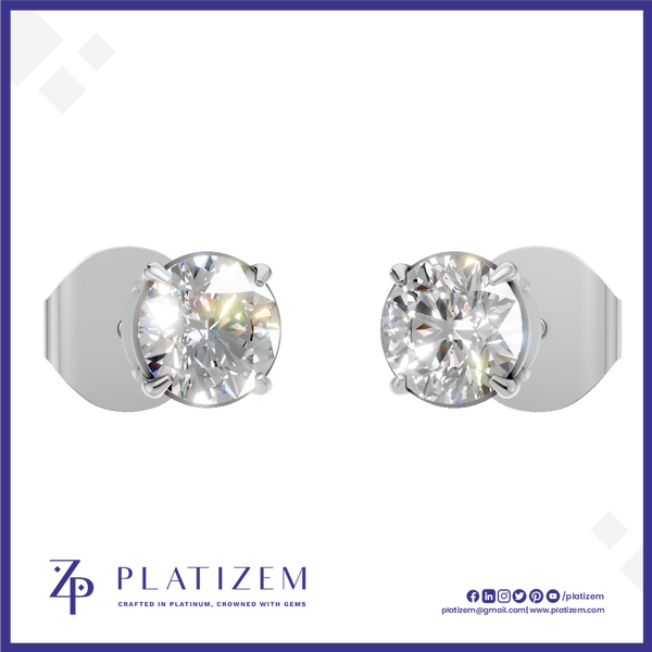 A pair of solitaire stud earrings with round brilliant-cut clear gemstones in a silver-toned setting, shown on a white background with the PLATIZEM brand logo at the bottom.