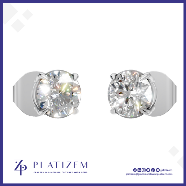 A pair of round-cut solitaire stud earrings in silver-toned metal with clear gemstones, shown on a white background with the PLATIZEM brand logo at the bottom.