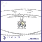 A silver-tone solitaire necklace with a round brilliant-cut clear gemstone pendant, displayed on a white background with the brand name PLATIZEM at the bottom.