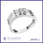 A silver-colored metal ring with a single round-cut clear gemstone in a prong setting, featuring a polished band with three parallel grooved stripes. The ring is presented on a white background with a blue border and the brand logo 'PLATIZEM' at the bottom.
