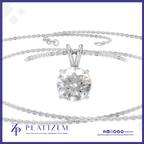 A silver-tone solitaire necklace with a round brilliant-cut clear gemstone pendant, displayed on a white background with the brand name Platzem at the bottom.