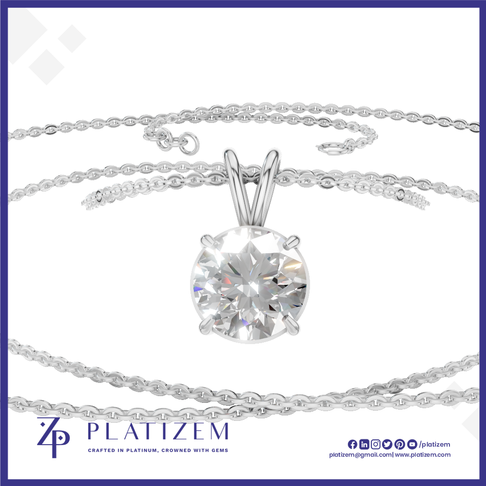 A silver-tone solitaire necklace with a round brilliant-cut clear gemstone pendant, displayed on a white background with the brand name Platzem at the bottom.