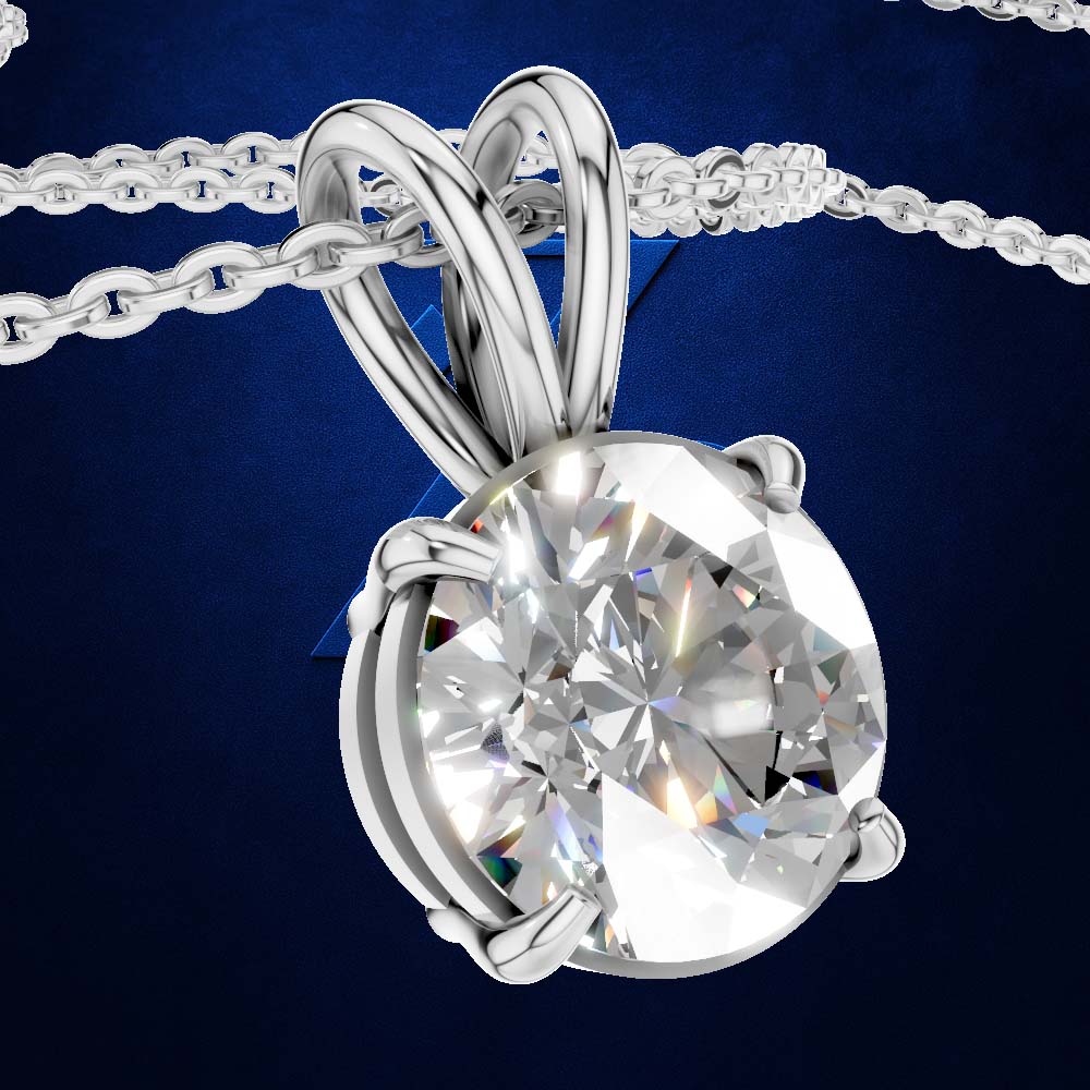A close-up studio shot of a silver-tone or white-metal pendant necklace with a large round clear gemstone in a prong setting, hanging against a deep blue background. No person, animal, or real environment is present, so this is Product/Packaging.