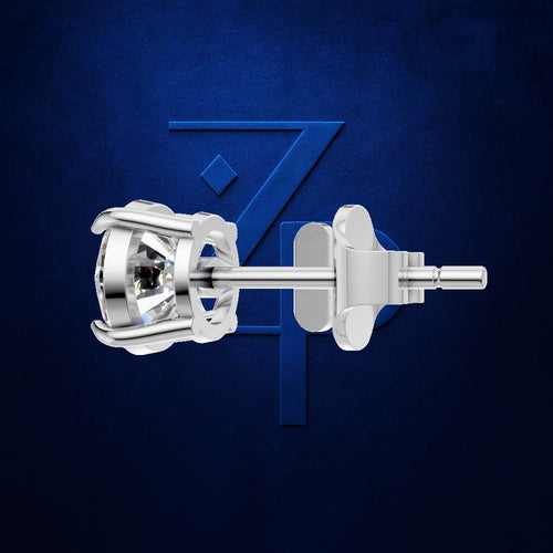 A silver-toned diamond stud earring shown in side profile against a textured dark blue background with a subtle stylized 'Z' logo behind it.