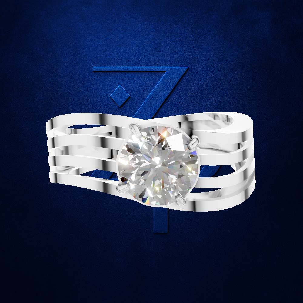 A silver-toned multi-band ring featuring a large, round brilliant-cut diamond center stone, presented against a textured dark blue background with a stylized blue '7' logo.