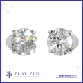 A pair of round-cut diamond stud earrings in a silver four-prong setting, displayed on a white background with a blue border. The brand name 'PLATIZEM' is visible at the bottom.