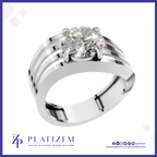 A platinum solitaire engagement ring featuring a round brilliant-cut diamond set in a four-prong setting, mounted on a polished three-strip band. The ring is presented on a white background with a blue border, and the brand name 'PLATIZEM' is visible at the bottom.
