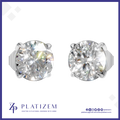 A pair of round brilliant-cut diamond stud earrings in a silver four-prong setting, displayed on a white background with a blue border. The brand name 'PLATIZEM' is visible at the bottom.