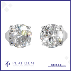 A pair of round brilliant-cut diamond stud earrings in a silver four-prong setting, displayed on a white background with a blue border. The brand name 'PLATIZEM' is visible at the bottom.