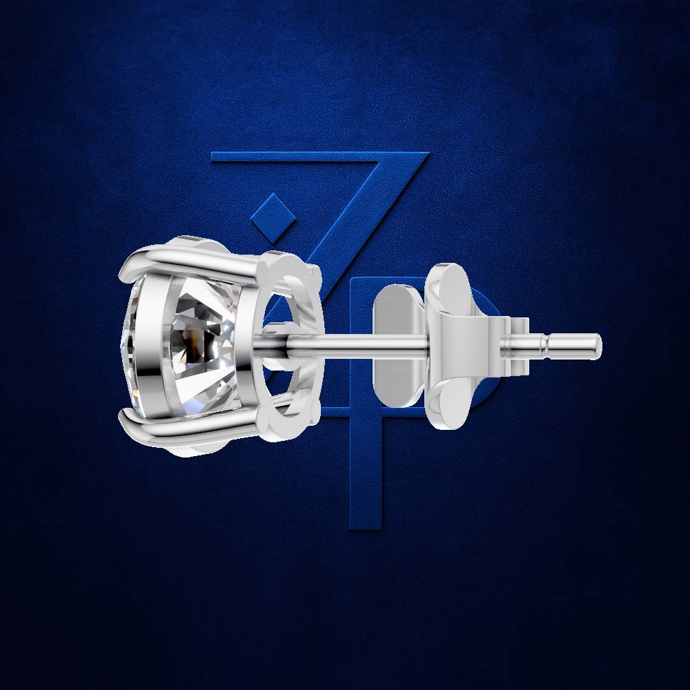 A single silver stud earring with a clear gemstone in a prong setting, shown from the side against a dark textured blue background with a subtle stylized 'Z' logo.
