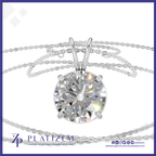 A round-cut diamond solitaire pendant necklace in a silver-toned setting with a matching chain, shown on a white background with a blue border and Platizem branding at the bottom.