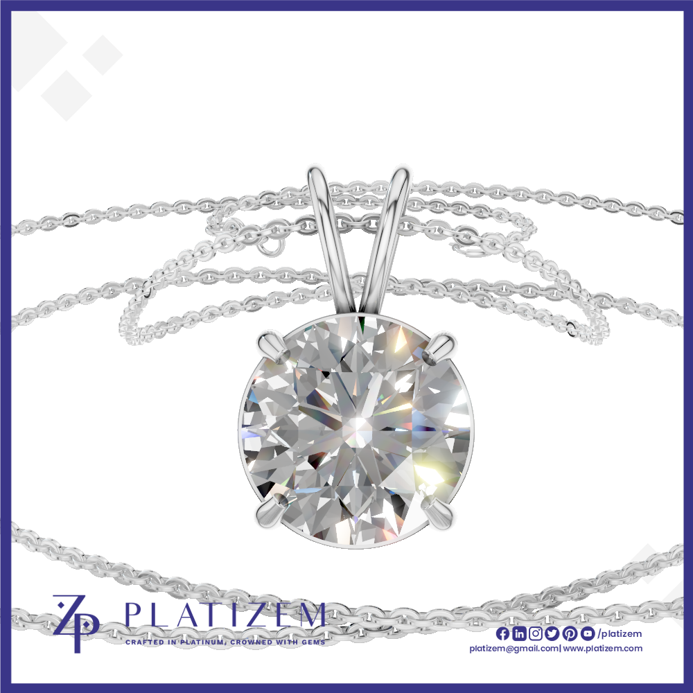 A round-cut diamond solitaire pendant necklace in a silver-toned setting with a matching chain, shown on a white background with a blue border and Platizem branding at the bottom.