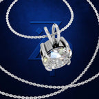 A silver-toned necklace with a bezel-set oval clear gemstone pendant, shown on a dark blue textured background with a faint stylized logo behind it.