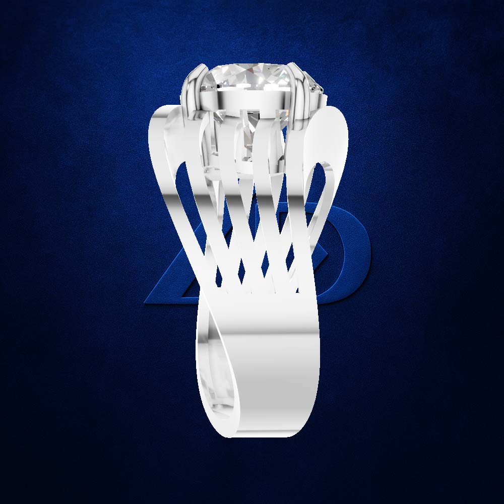 A silver-toned ring with a large clear gemstone and an intricate openwork geometric band, shown against a dark blue textured background.
