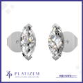 A pair of silver stud earrings with marquise-cut clear gemstones, displayed on a white background with the brand name PLATIZEM at the bottom.