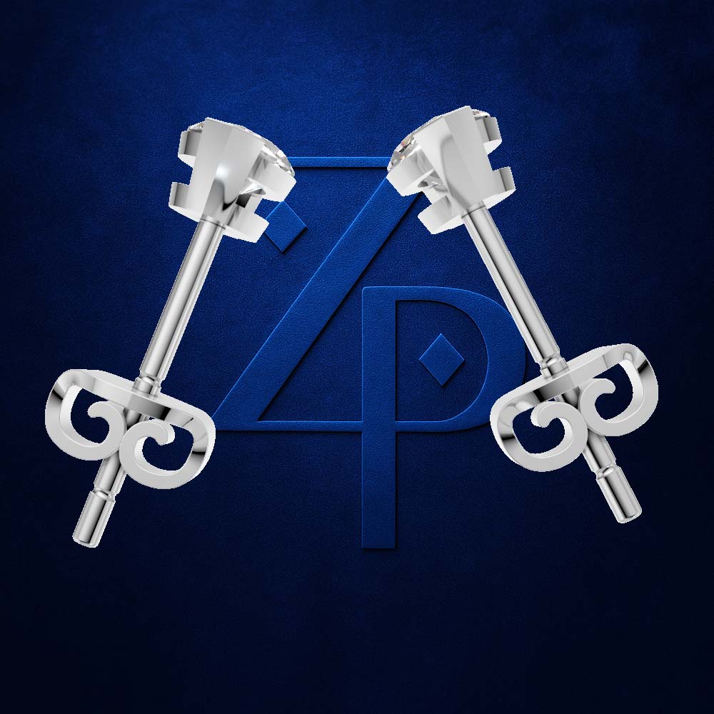 Two polished silver-toned jewelry pieces with ornate scrollwork ends and a central geometric emblem, arranged symmetrically on a dark blue textured background with a large blue monogram behind them.