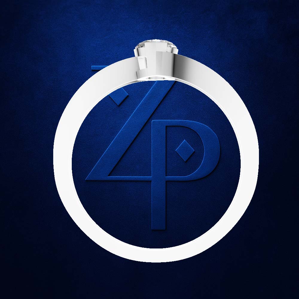 A silver ring with a large oval face featuring a blue and white geometric emblem, set against a textured dark blue background.