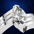 A close-up studio render of a silver-toned ring with a large marquise-cut clear gemstone, shown against a deep blue background.