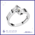A silver-plated engagement ring with a marquise-cut clear gemstone, featuring a split shank design with polished and striped detailing. The ring is presented on a white background with a blue border, branded with the 'Platizem' logo at the bottom.