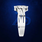 A silver-toned diamond ring with a unique split-shank design and a round-cut center stone, shown against a dark blue textured background with a subtle Avengers logo.