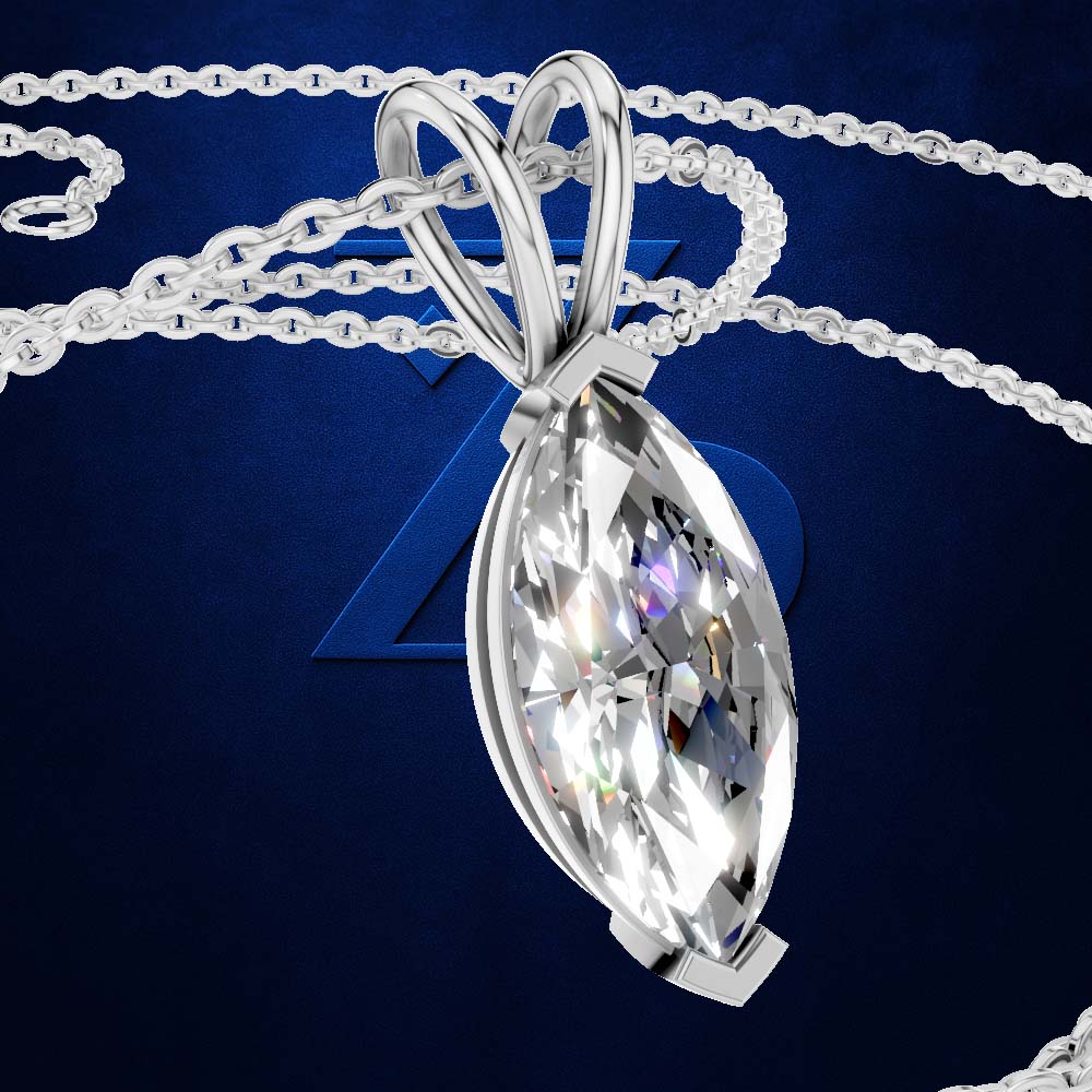 A silver-tone pendant necklace featuring a large, faceted marquise-cut clear gemstone, displayed on a dark blue textured background with a matching silver chain.