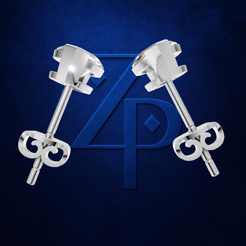 A pair of polished silver-toned stud earrings with geometric crown-like tops and bow-shaped butterfly backings, displayed against a dark blue textured background with a large blue monogram logo behind them.
