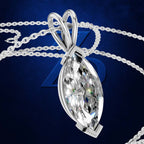 A silver-tone pendant necklace featuring a large marquise-cut clear gemstone, shown against a dark blue background with a chain draped behind it.