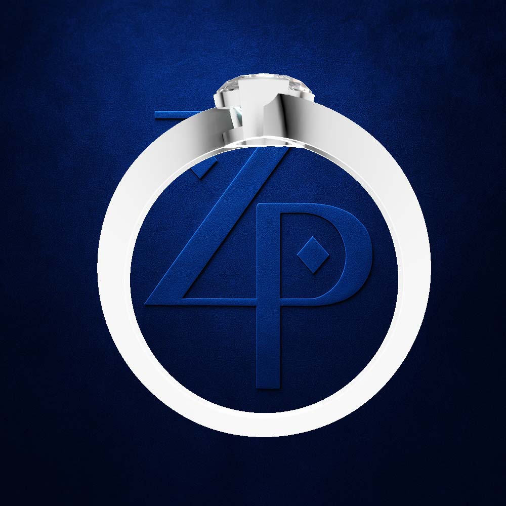 A silver-toned ring with a large clear gemstone, shown against a textured dark blue background. The ring is positioned over a matching blue circular emblem featuring stylized 'ZP' lettering.