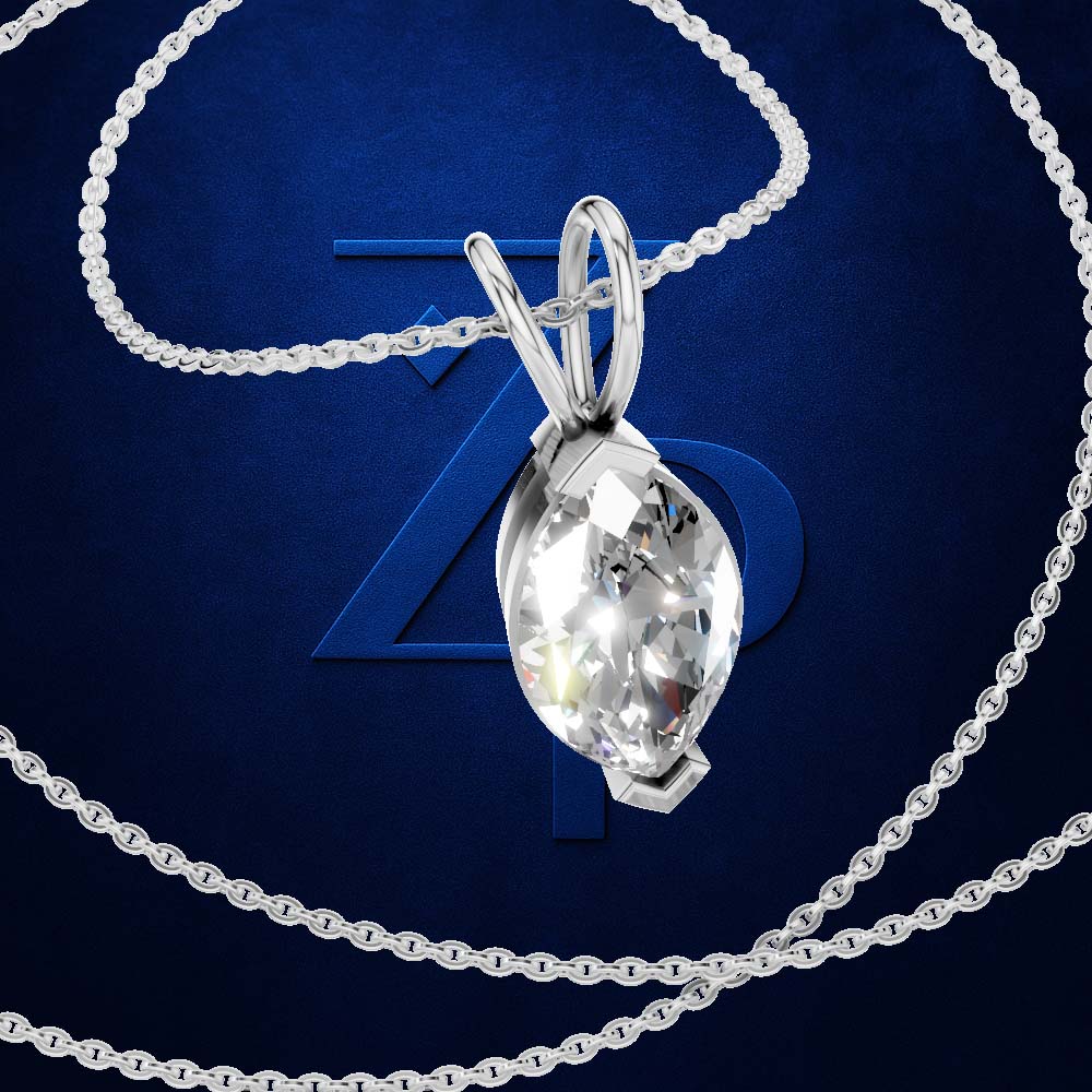 A silver-toned teardrop-shaped crystal pendant necklace with a matching chain, displayed against a dark blue textured background with a large stylized '7' behind it.