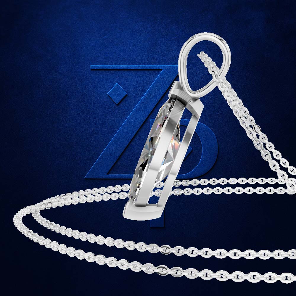 A silver-toned pendant necklace with a faceted rectangular drop and a matching chain, displayed on a dark blue textured background with a large stylized Z logo.