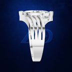 A silver-colored ring with a large clear gemstone and a unique multi-pronged, sculptural band, shown against a dark blue textured background with a subtle Avengers logo.