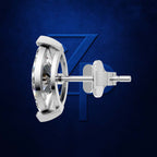A polished silver-toned stud earring shown in side profile against a dark blue textured background with a subtle geometric logo.