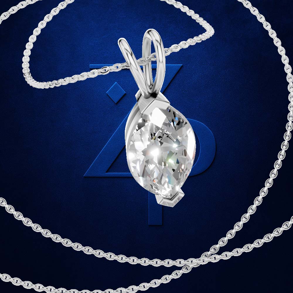 A silver-toned pendant necklace featuring a marquise-cut clear gemstone in a prong setting, suspended from a matching chain against a dark blue textured background with a large stylized '4' behind it.