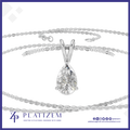 A silver-toned platinum necklace featuring a teardrop-shaped clear gemstone pendant, displayed on a clean white background with the Platzem brand logo at the bottom.