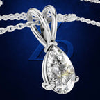 A teardrop-shaped diamond pendant in a polished silver-colored setting on a matching chain, set against a dark blue textured background with a subtle stylized logo.