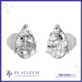 A pair of pear-shaped diamond stud earrings in a silver-toned setting, displayed on a white background with a blue border. The brand name 'PLATIZEM' is visible at the bottom.