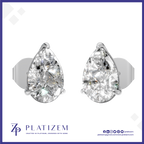 A pair of pear-shaped diamond stud earrings in a silver-toned setting, displayed on a white background with a blue border. The brand name 'PLATIZEM' is visible at the bottom.