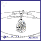 A silver teardrop-shaped pendant necklace with a clear gemstone, displayed on a white background with a coiled chain and the brand name 'PLATIZEM' at the bottom.