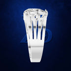 A silver-toned ring with a large clear gemstone in a geometric prong setting, shown against a dark blue textured background with a faint blue logo behind it.
