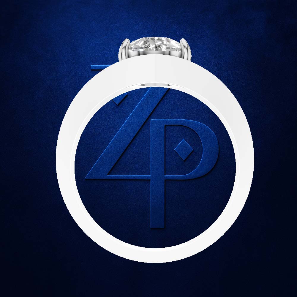 A silver ring with a round brilliant-cut diamond set in a white bezel, centered against a textured dark blue background. The ring is framed by a large white circular graphic overlay featuring a stylized blue 'ZP' monogram.
