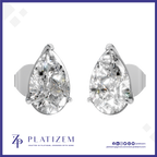 A pair of pear-cut diamond stud earrings in silver settings, displayed on a white background with a blue border. The brand name 'PLATIZEM' is visible at the bottom.