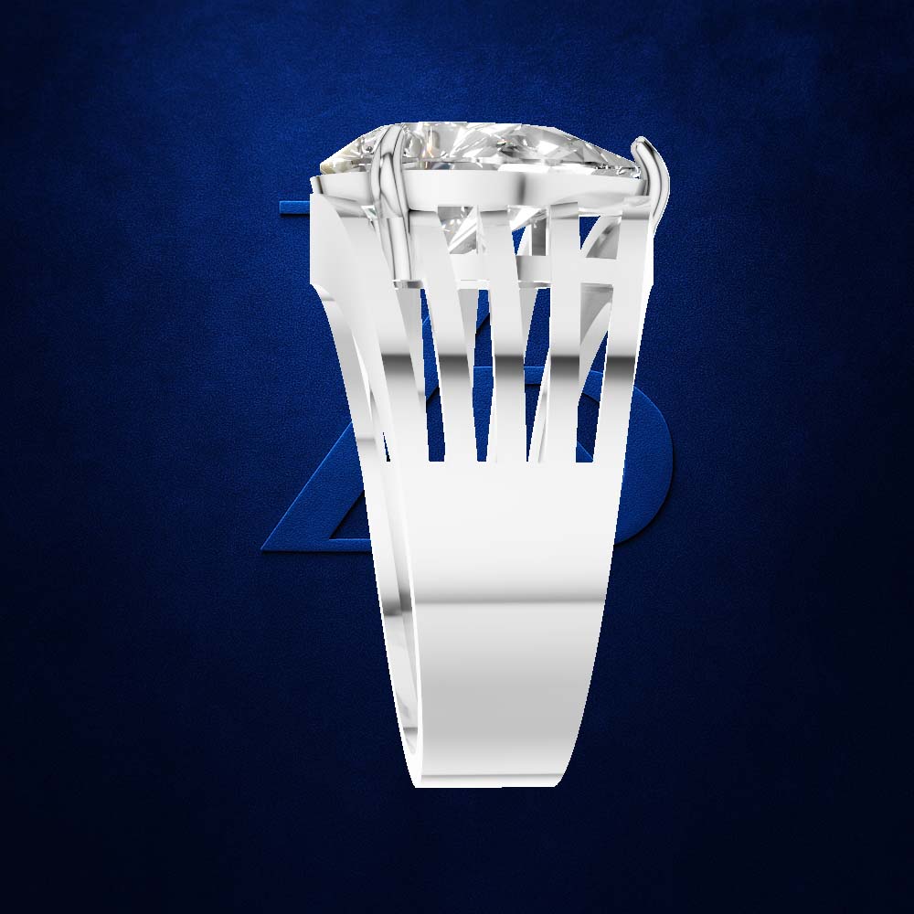 A silver-toned ring with a large clear gemstone and an openwork geometric band, shown against a dark blue textured background.