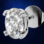 An oval-cut diamond stud earring in a polished silver-toned setting, shown close-up against a dark blue textured background.
