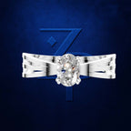 A silver-toned solitaire engagement ring with an oval-cut clear gemstone, displayed against a dark textured blue background with a large stylized blue 'Z' logo behind it.