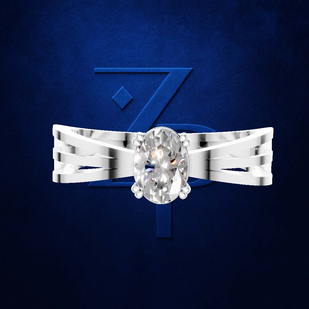 A silver-toned solitaire engagement ring with an oval-cut clear gemstone, displayed against a dark textured blue background with a large stylized blue 'Z' logo behind it.